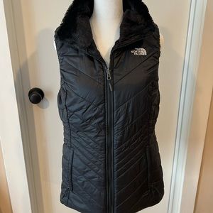 Women’s North Face reversible fur or micro puff outer vest size M